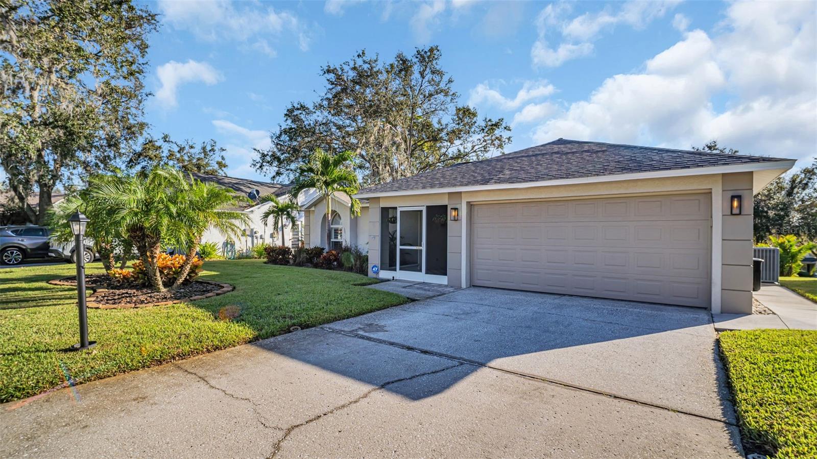 2 car garage with a  double driveway.