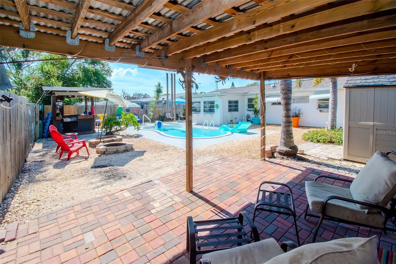 16x16 METAL ROOF Pergola WITH PAVERS AND SOLAR TWINKLE LIGHTS