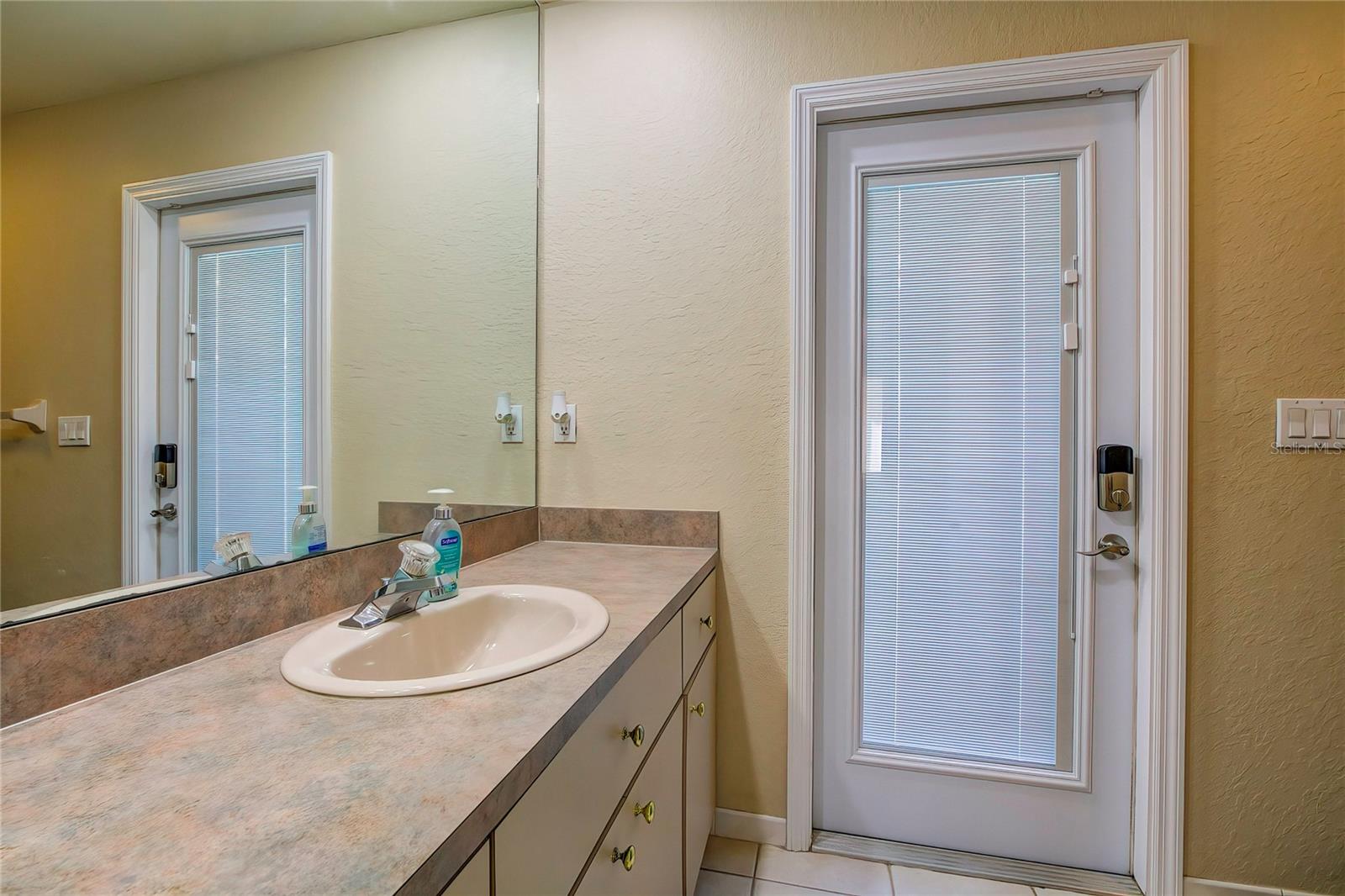 Main Bathroom door to pool area