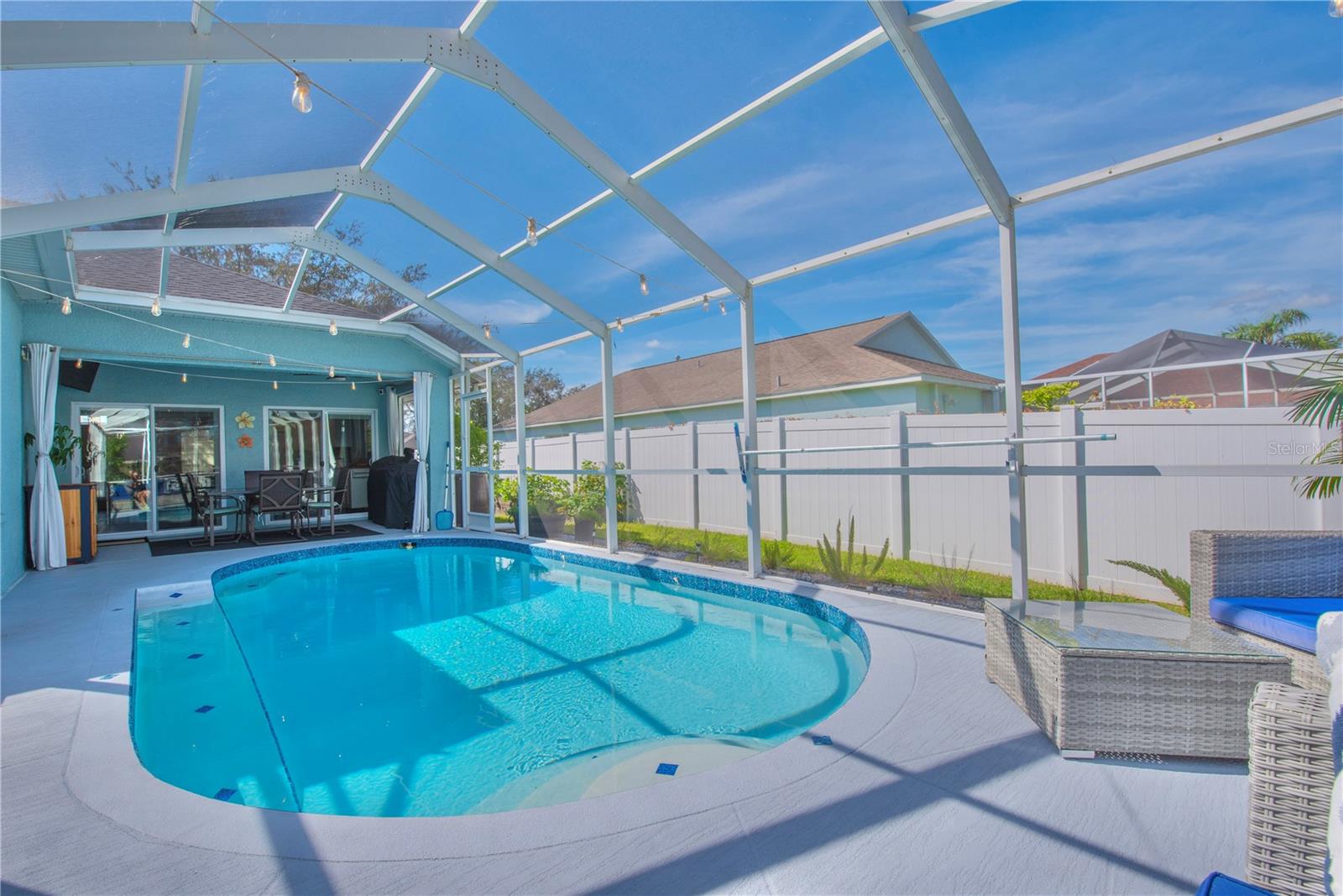 Screen pool with covered lanai.