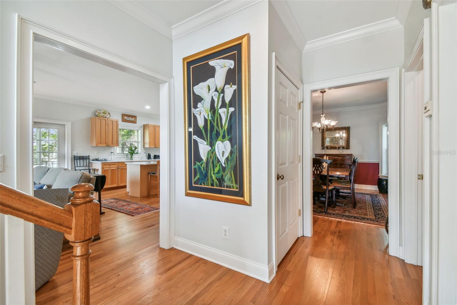 The Kitchen Family Room on your L. The separate Formal DR in the background w/ LR on right