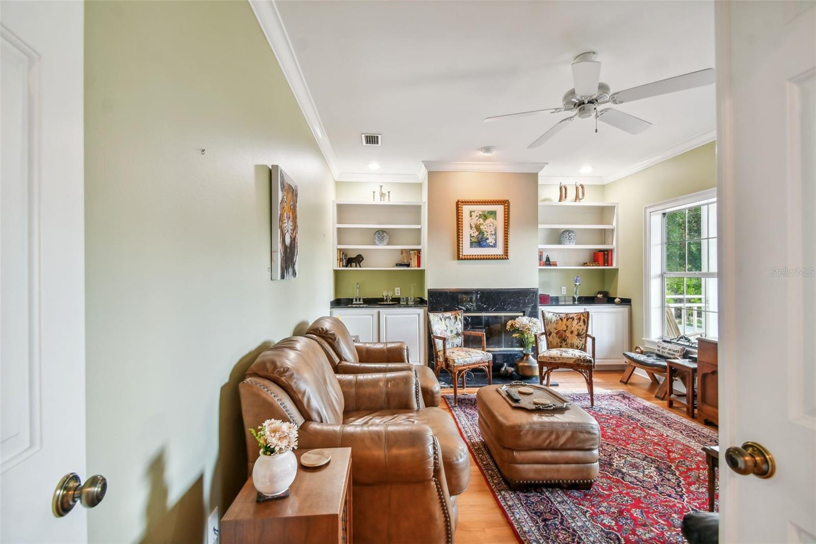 French Doors into Living Room - please note the fireplace and Wet Bar!