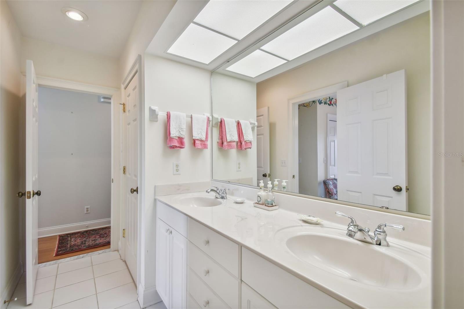 Many doors to the adjoining Bath + Linen Closet on 3rd Floor between 2 Bedrooms