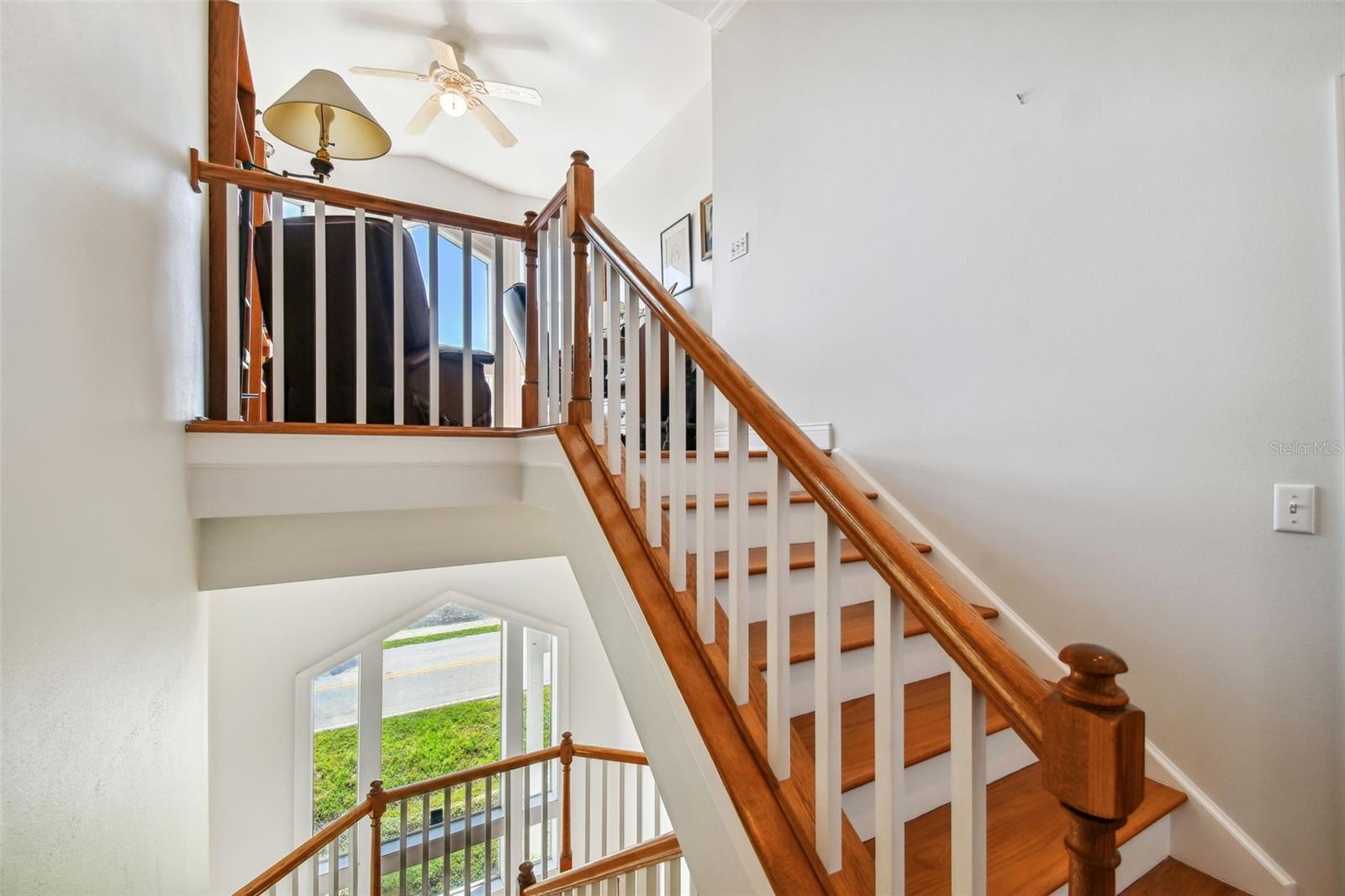 Large Walk In Laundry Room w/ sink under window, built in cabinetry and Quartz countertops!