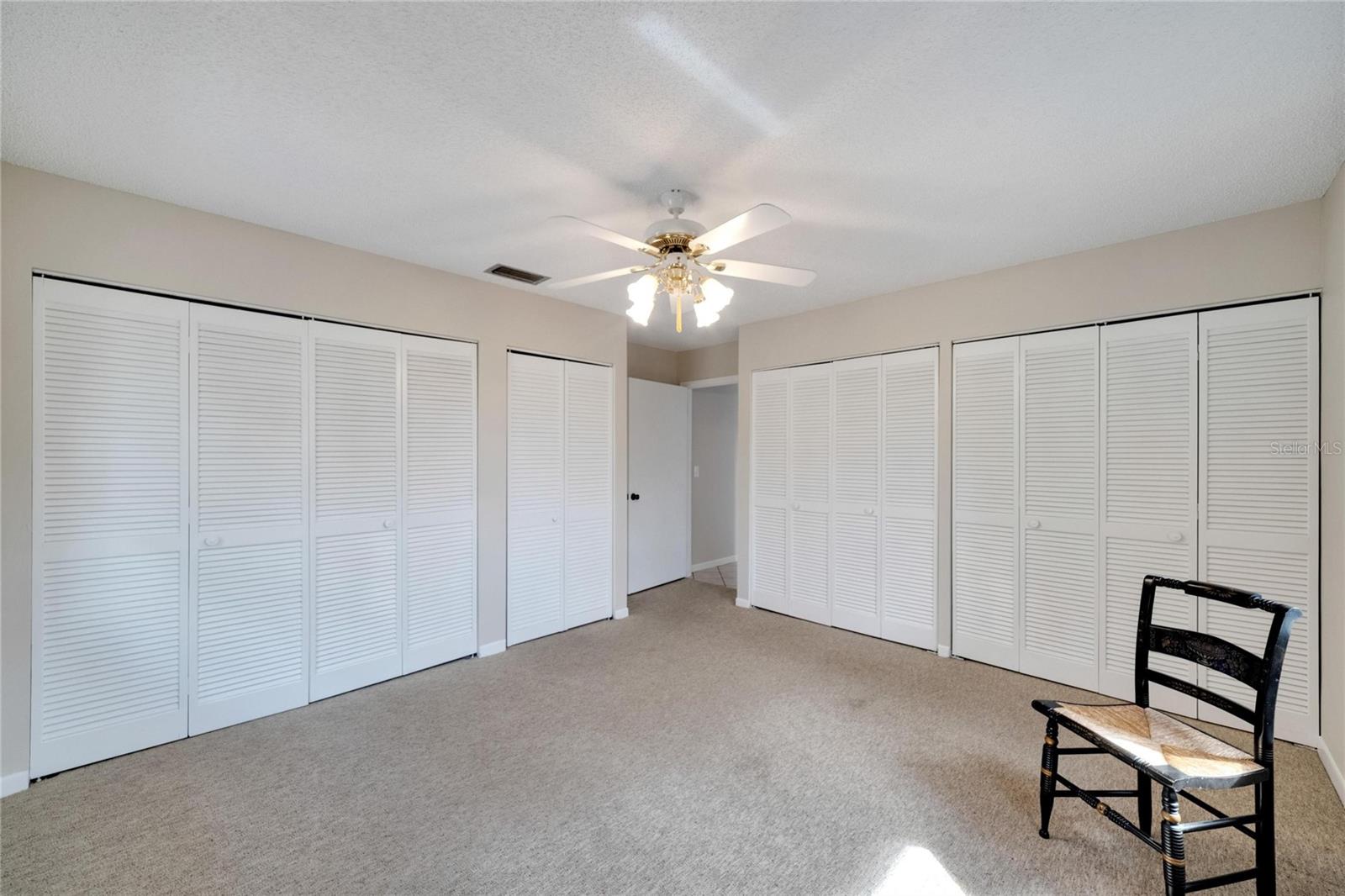 bedroom 2 with plenty of closet spaace