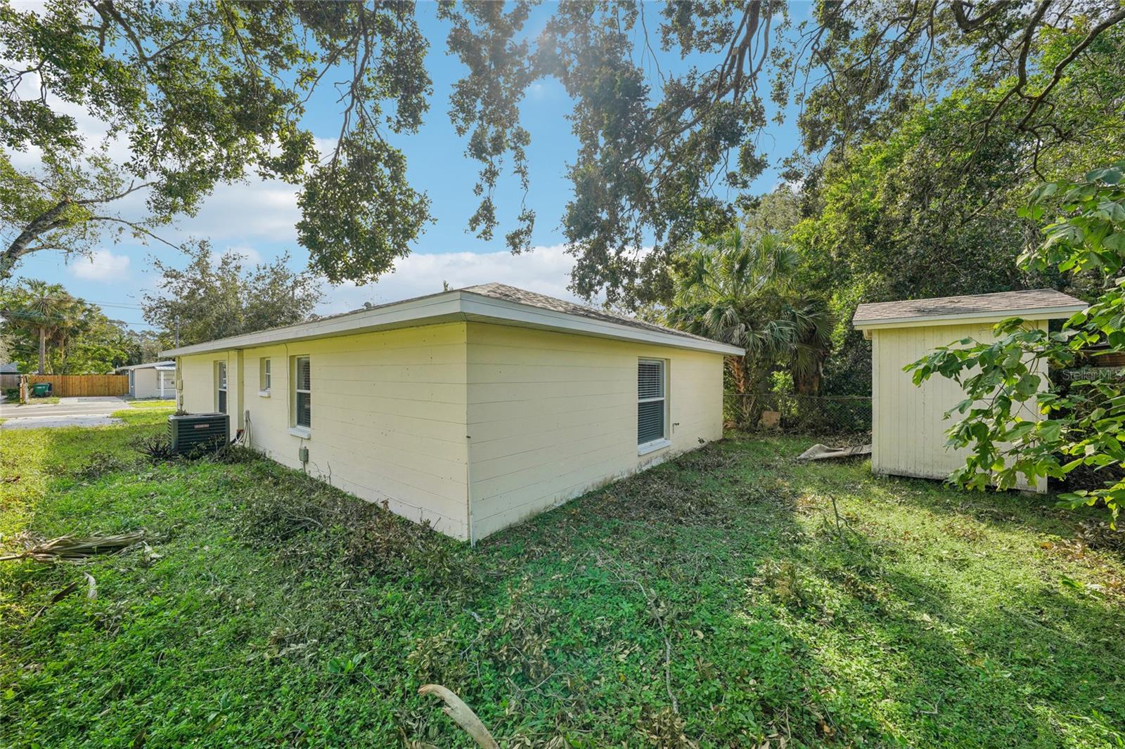 Back of home angle with shed