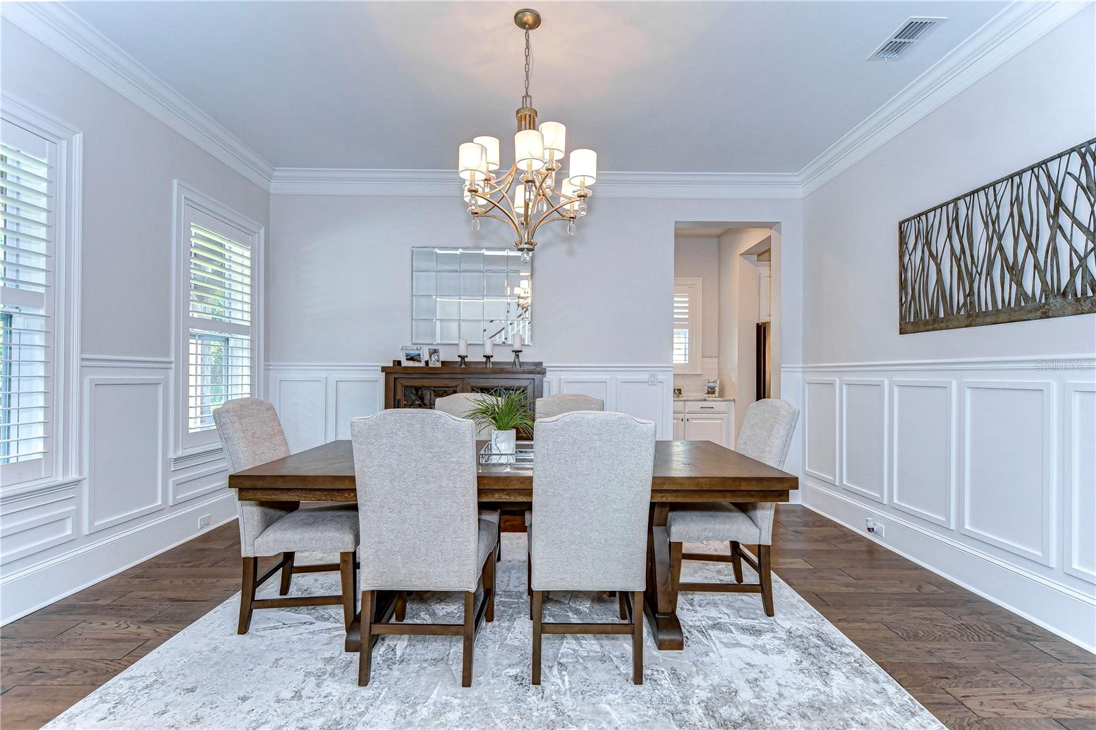 Formal dining room is ideal for hosting family gatherings!