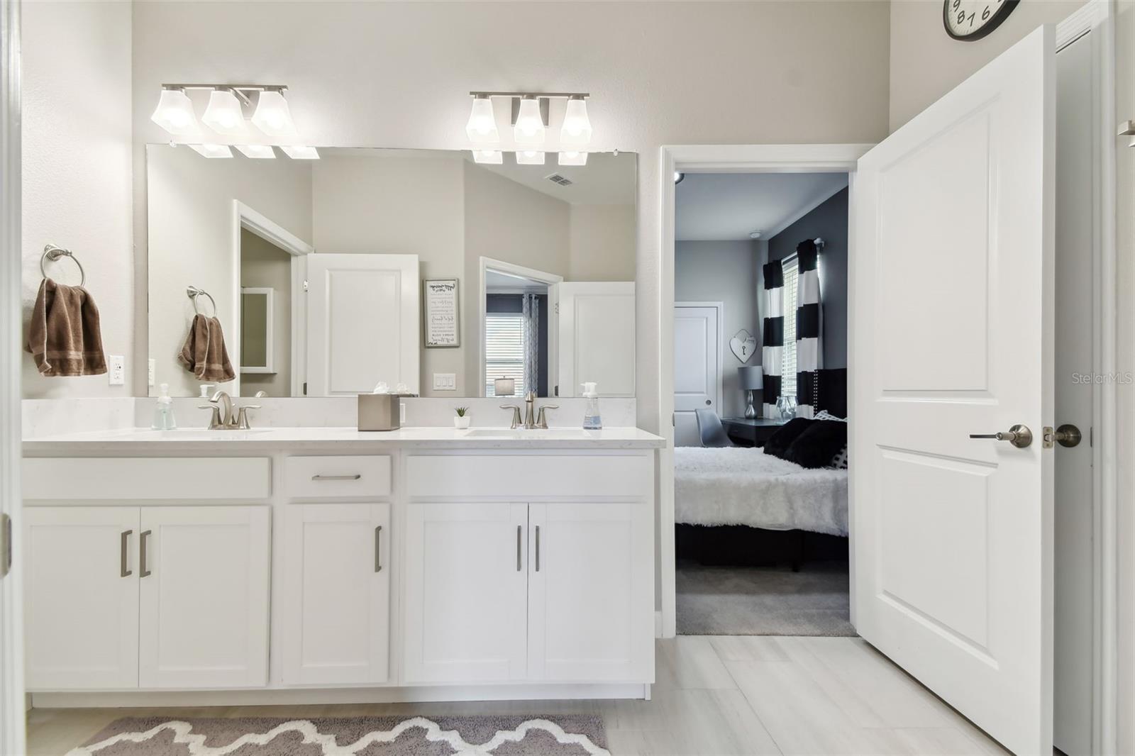 secondary bath with dual vanity and sinks