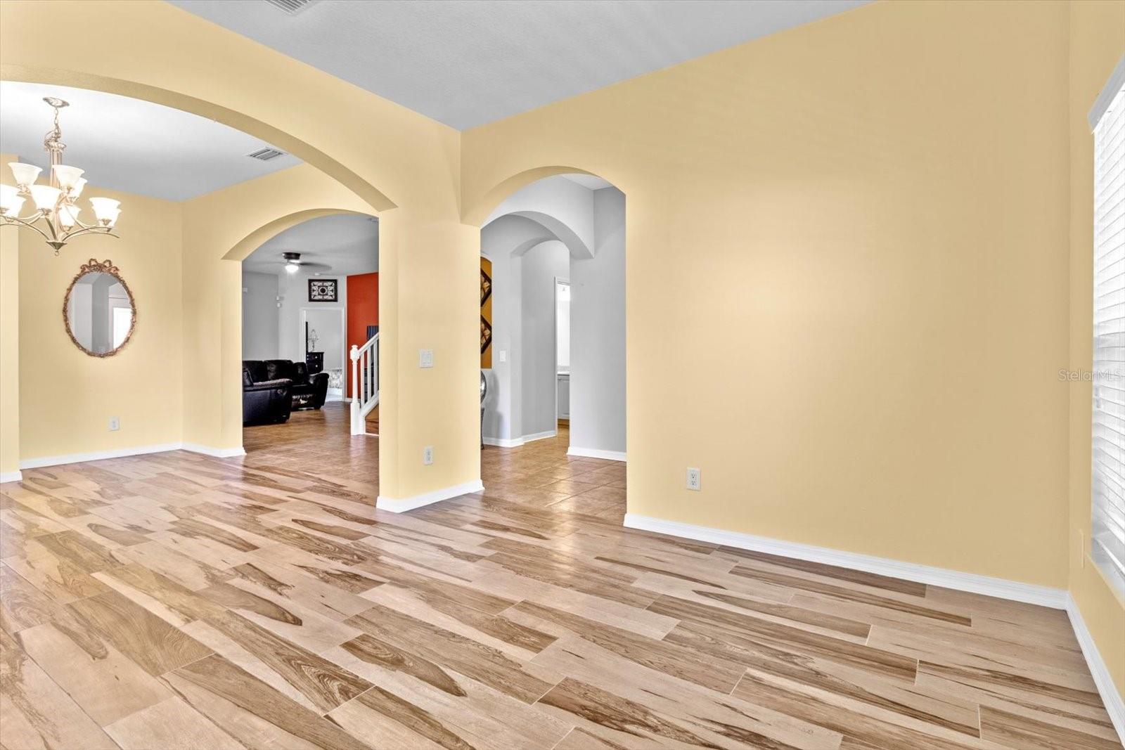 View from Formal Living Room into Dining Room and hall