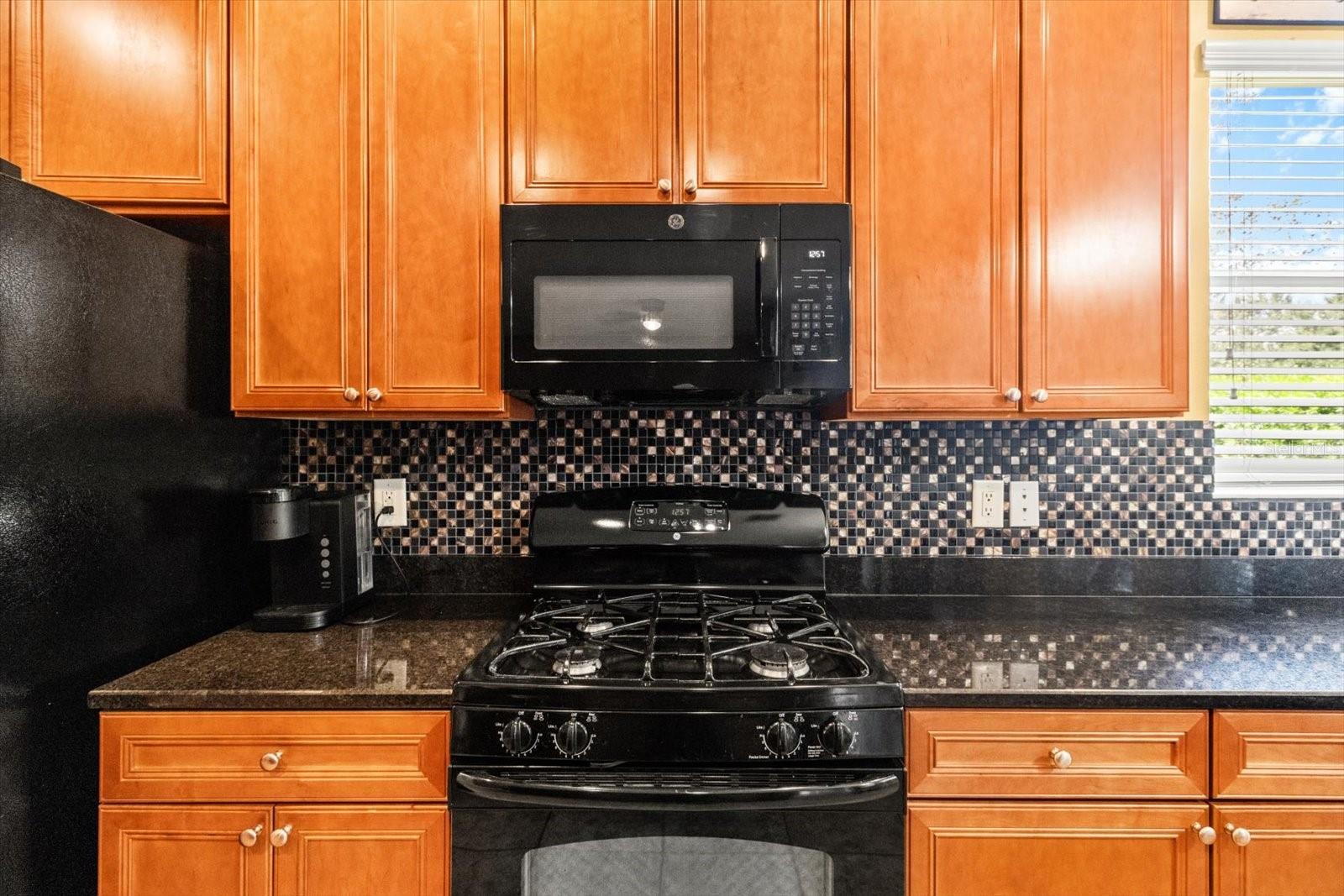 Gas Range, Solid Wood Cabinets, Granite Countertops