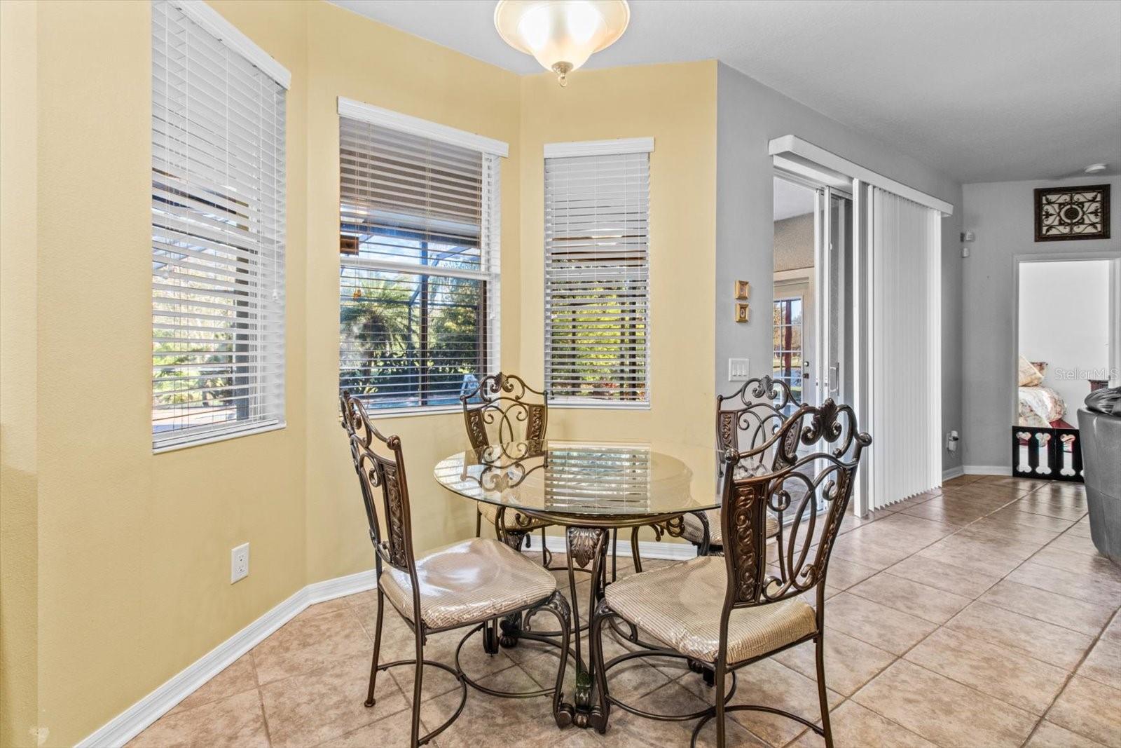 Breakfast Nook with Bay Window Feature Overlooks Pool, Lanai, Pond