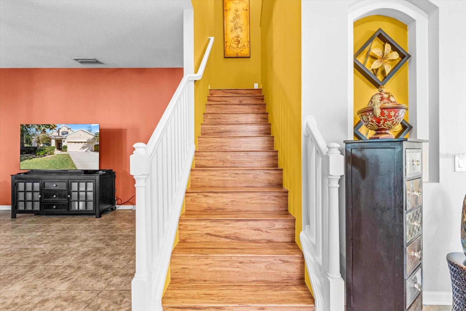 Stairs Leading to Second Level which includes 3 Bedrooms (One with Walk in Closet), A Sitting/ Reading/ Media Area and a Full Sized Bathroom