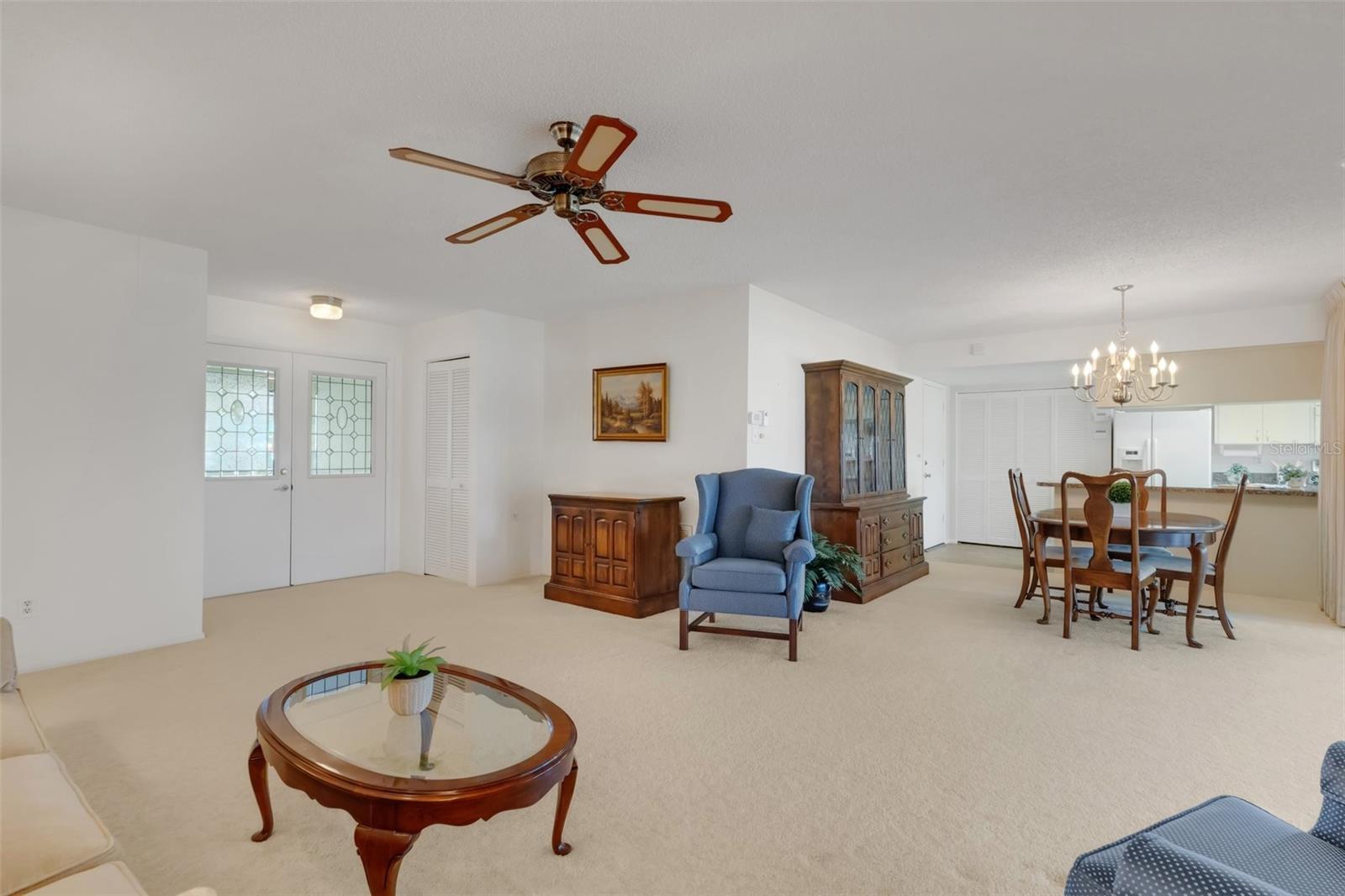 Double door entry with foyer closet into main living~