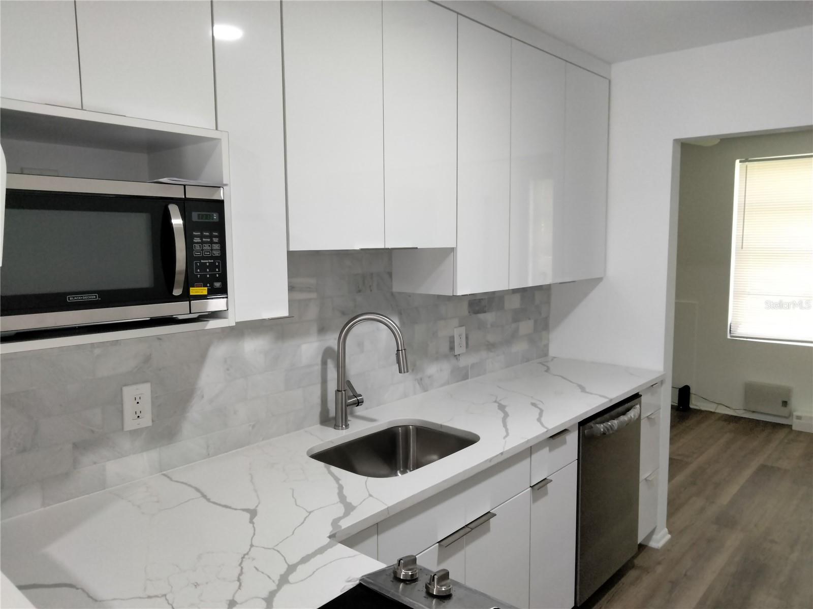 Kitchen view to family room