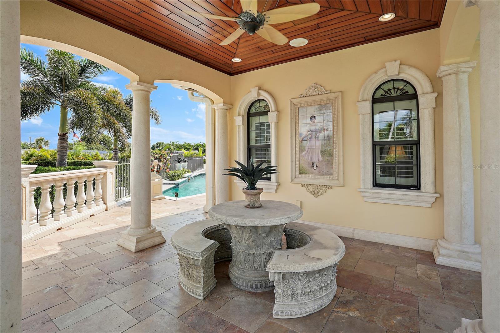 Veranda with Teak Ceiling and Concrete Bench3341 Gulf Blvd, Belleair Beach, FL