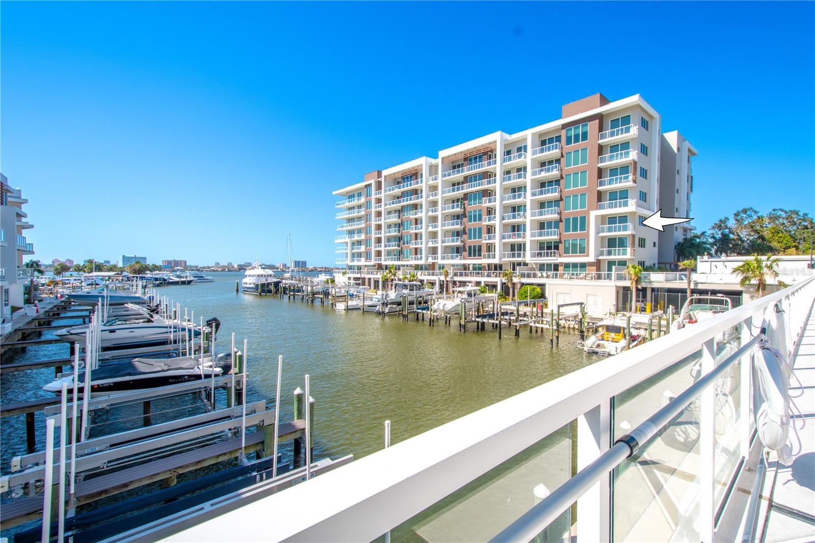 Views out to the harborWaterfront, Corner/End Unit, 2-Bedroom, 2-Bath, 2-Balconies, Move-In Ready Condo with Garage Parking in Secure Building.