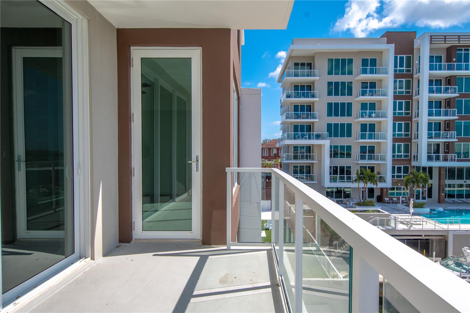 Access the balcony from the living room and/or 2nd bedroom.