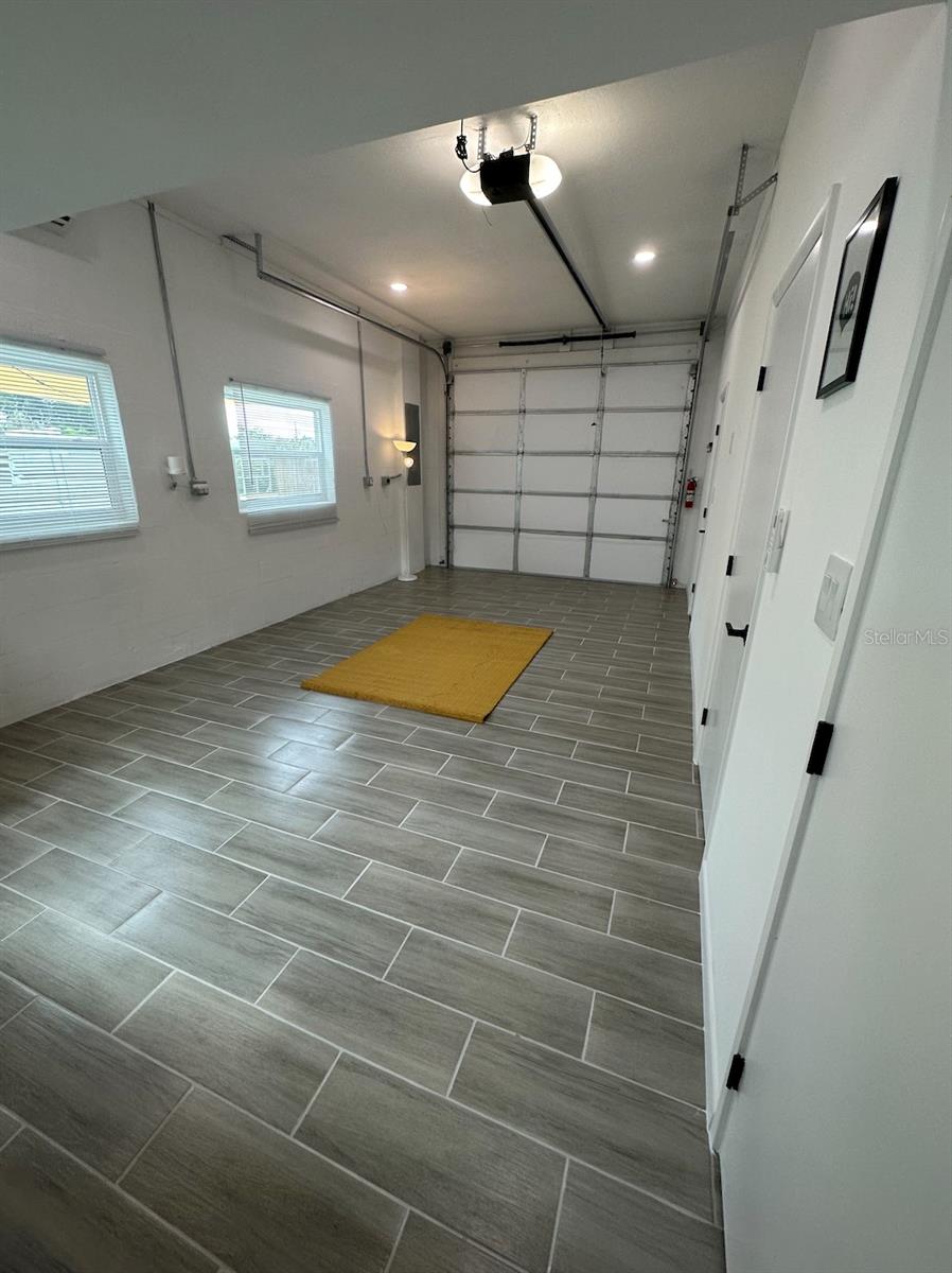 GARAGE WITH STORAGE AREA + WALKING CLOSET + BATHROOM