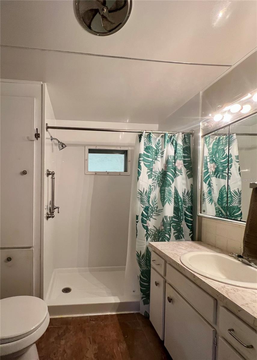 Hallway bathroom with new walk in shower