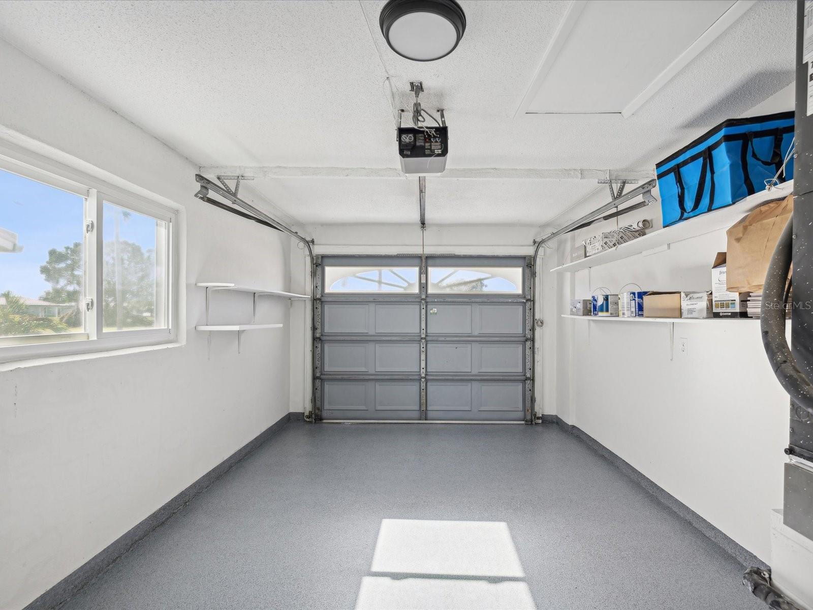 Garage with epoxy floor, transferable lifetime warranty