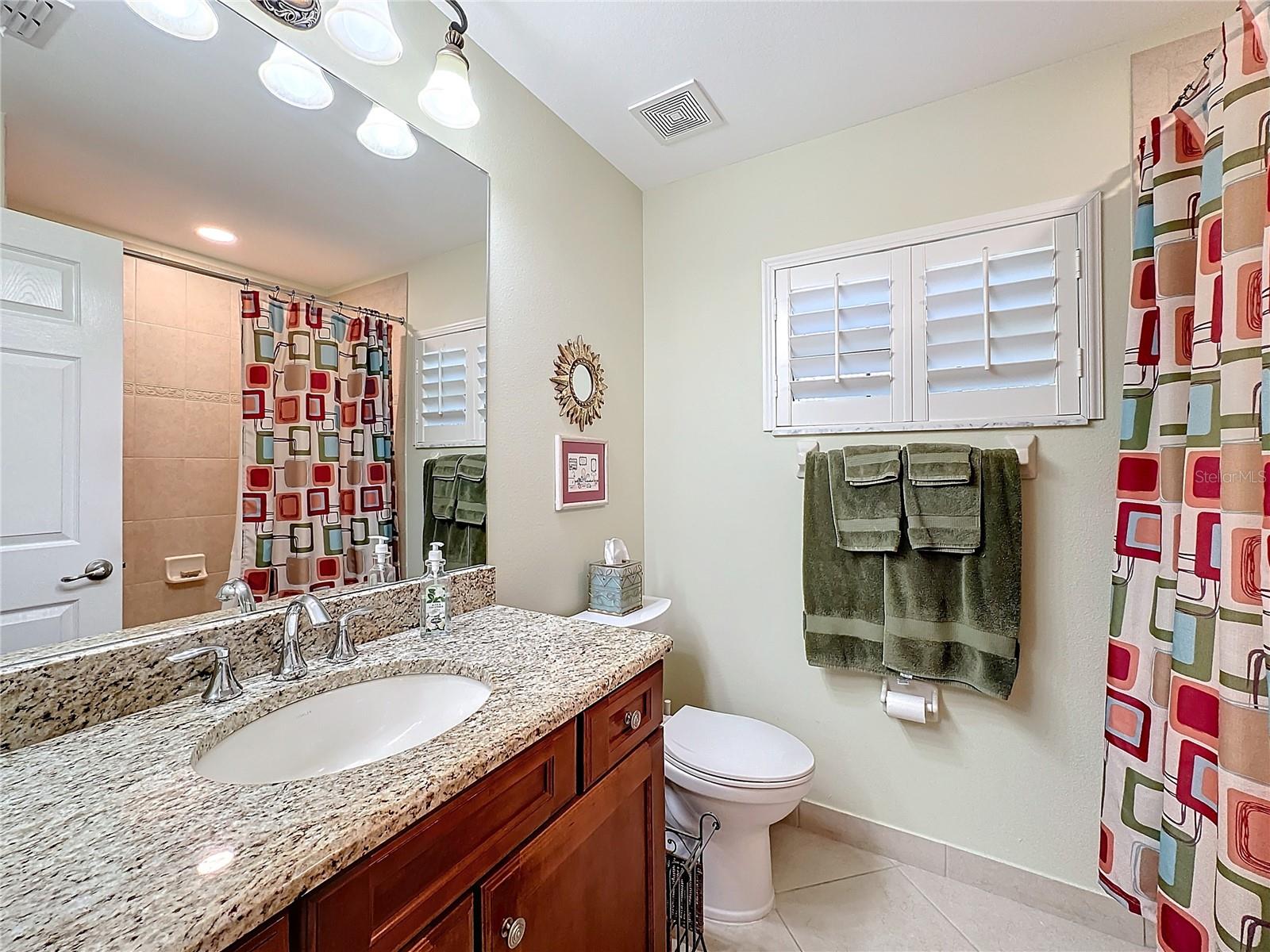 2nd Bathroom with shower tube.