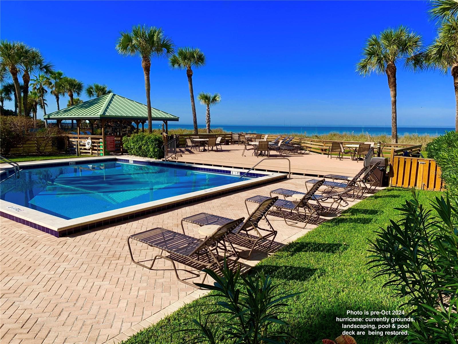 Seaside pool before Oct 2024 hurricane: currently being restored to this pristing condition.