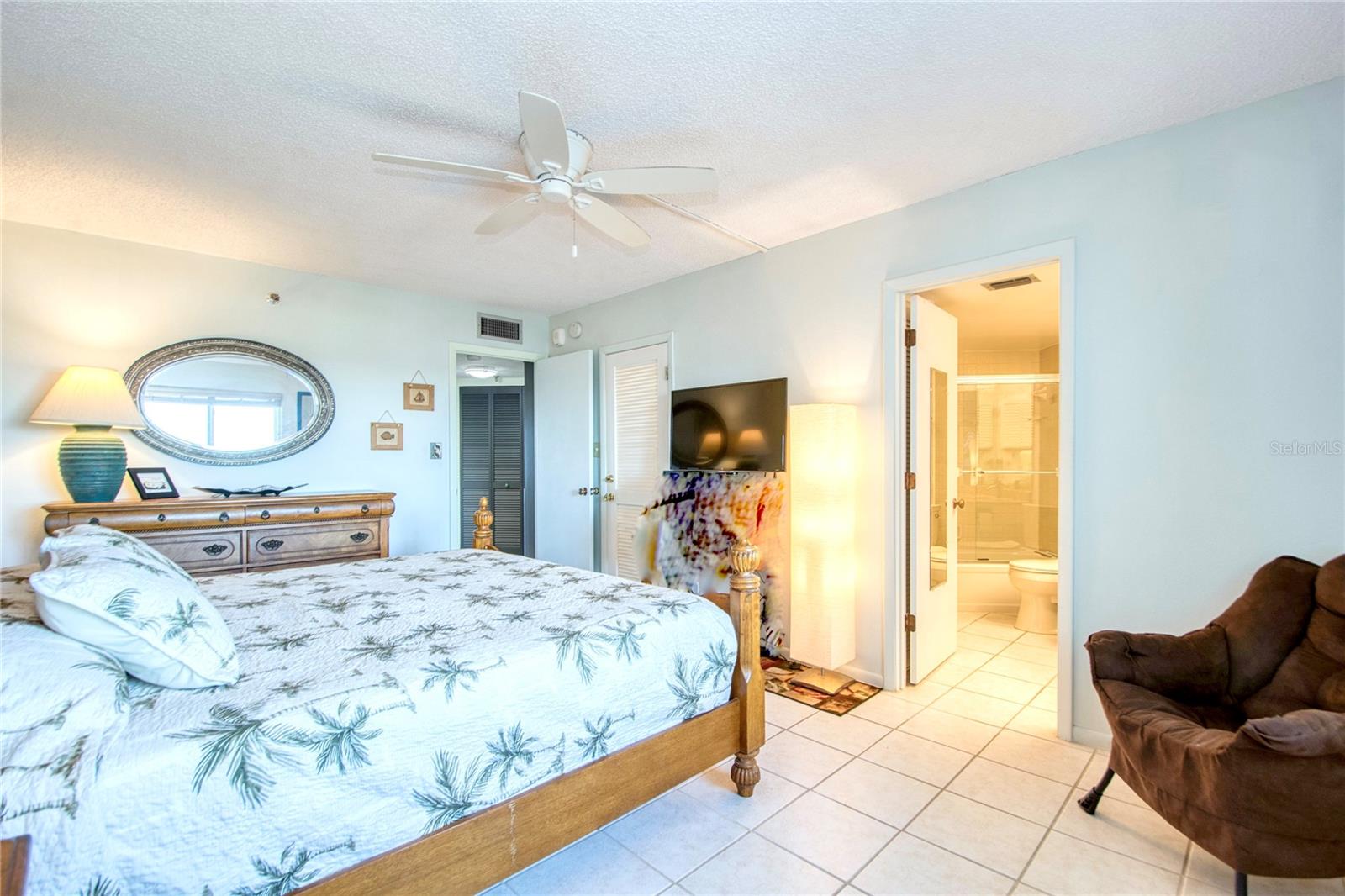 Walk in closet in primary bedroom suite.