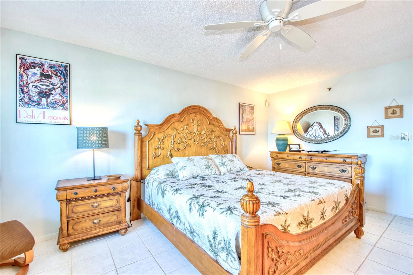 Primary bedroom Suite with peek-a-boo water views & walk in closet.