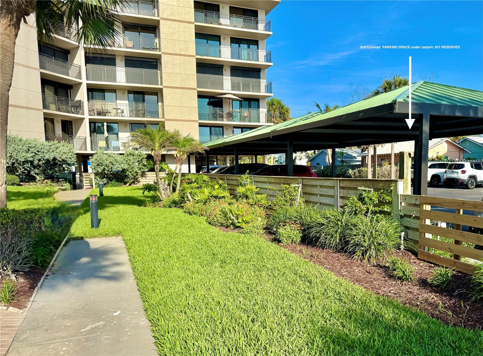 2 parking spaces deeded #31 under carport on South Side (shown) and #05 under building on the North Side.