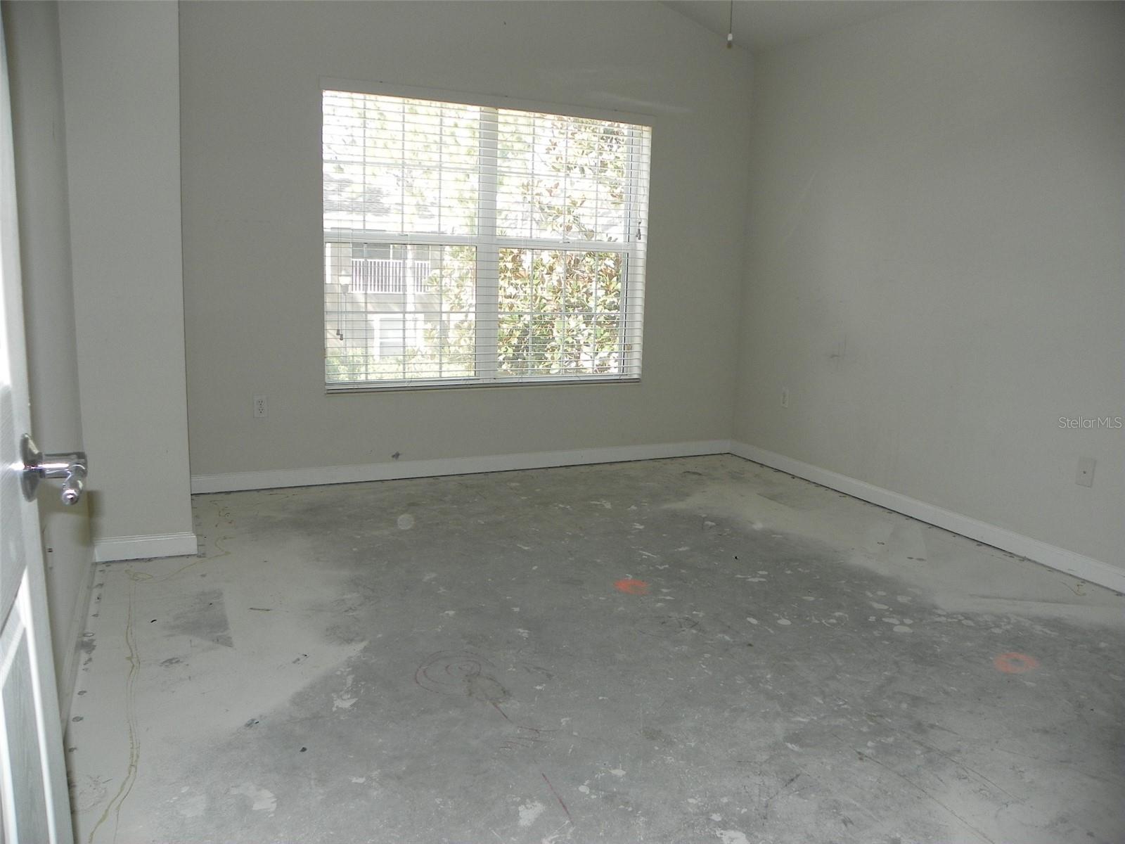 Guest Bathroom with door to additional entrance to second bedroom