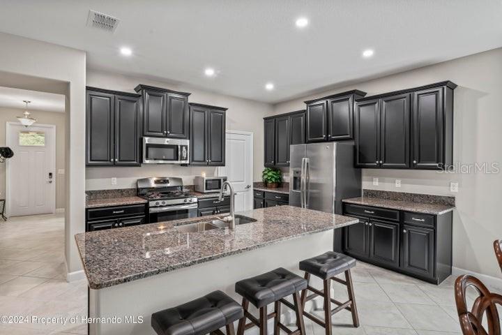 kitchen bar - stainless appliances