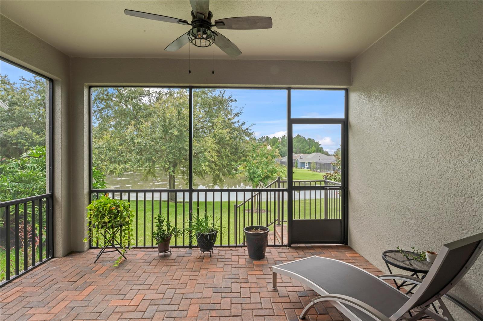 back porch screened with pavers