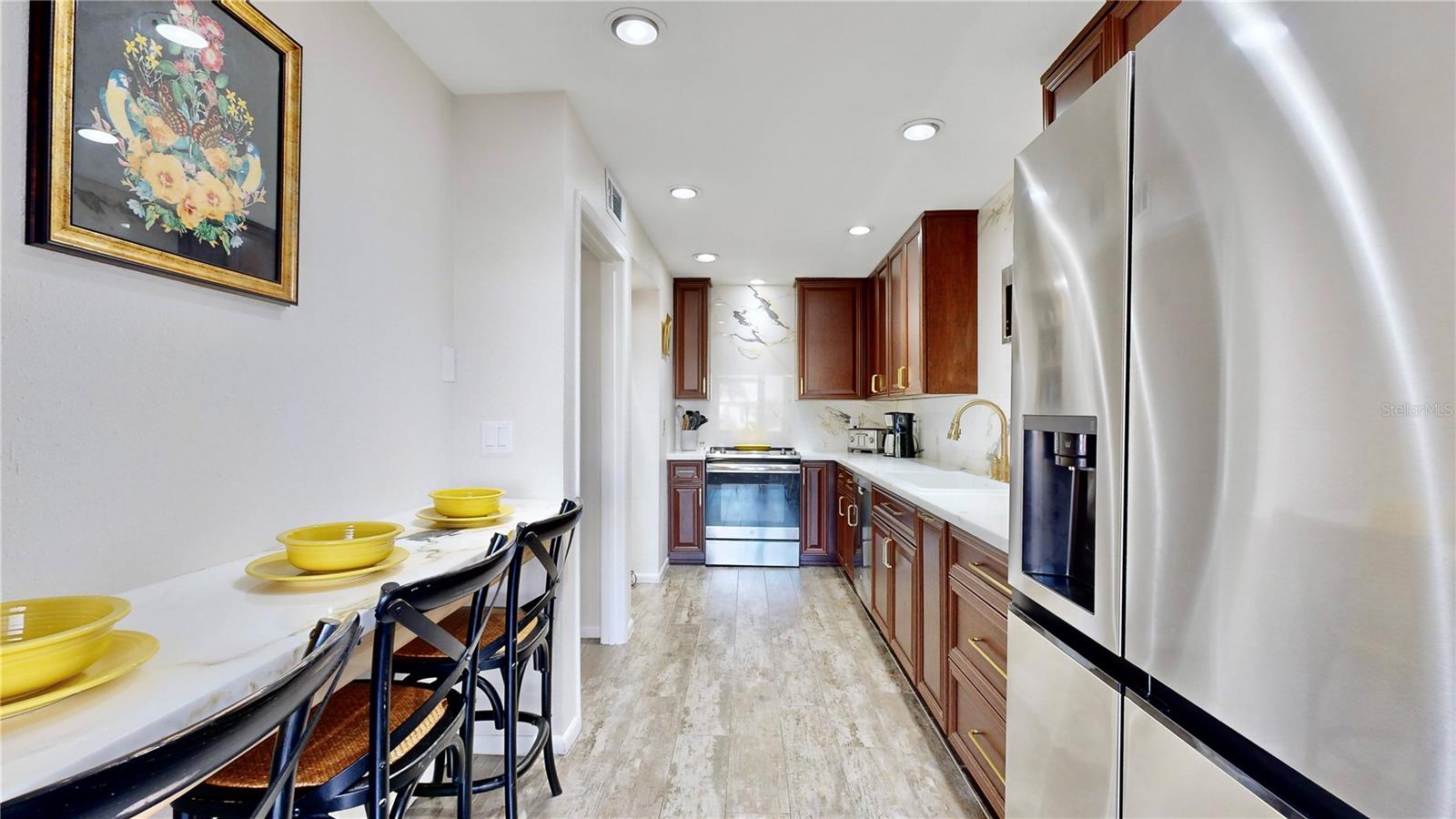 Eat in kitchen with new stainless steel appliances!