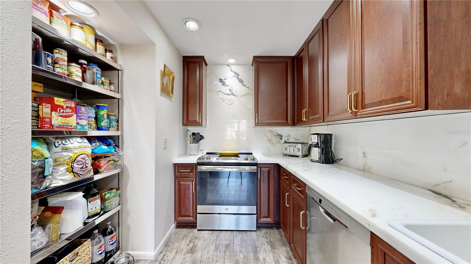 Enjoy the beautiful and spacious countertops and flexible storage options!