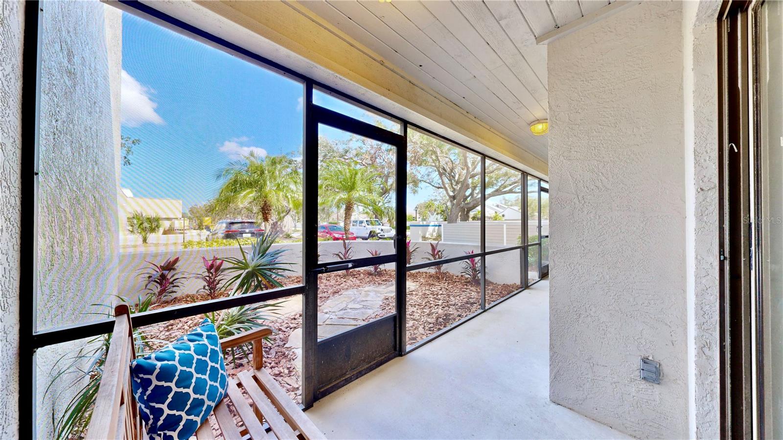 Your screened porch and private garden area.