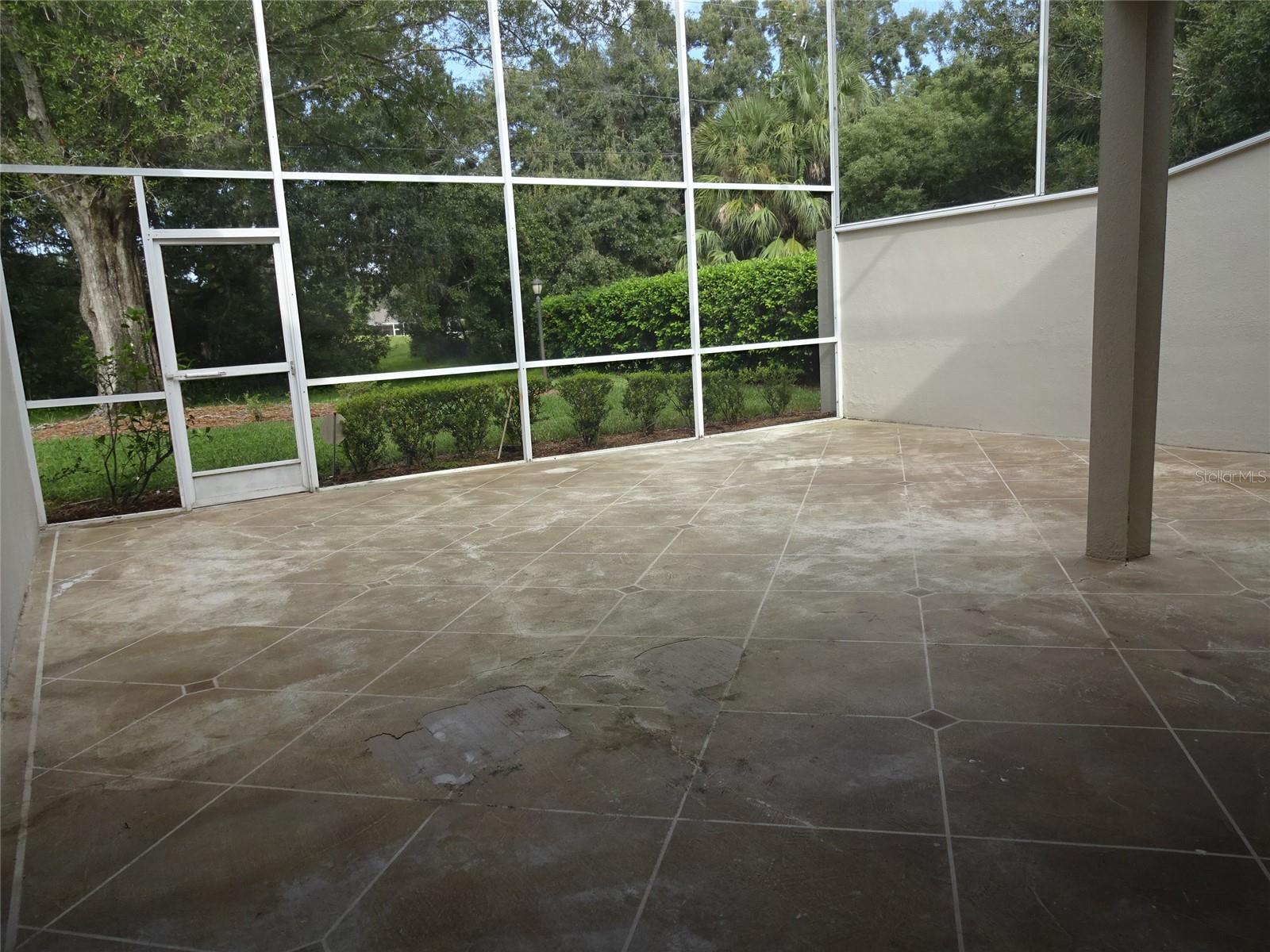 Large screened patio off of living room and kitchen