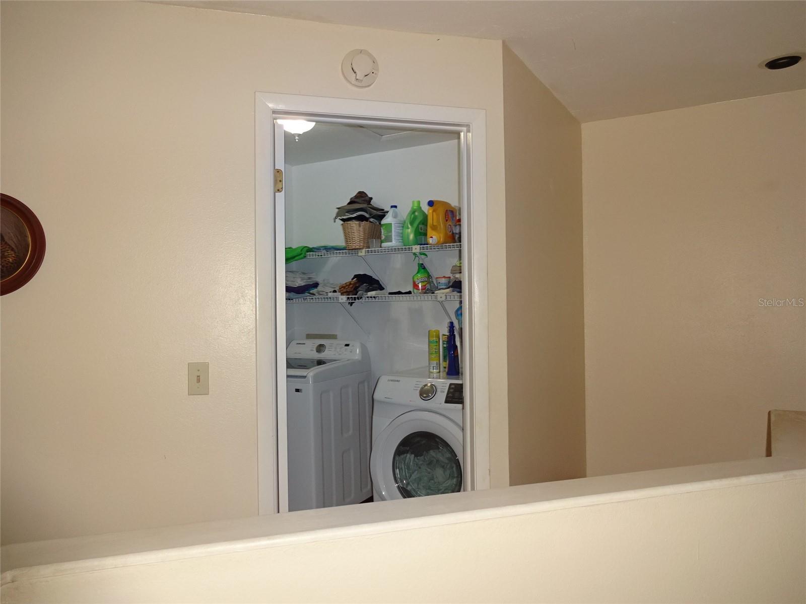 Hallway into laundry area...upstairs