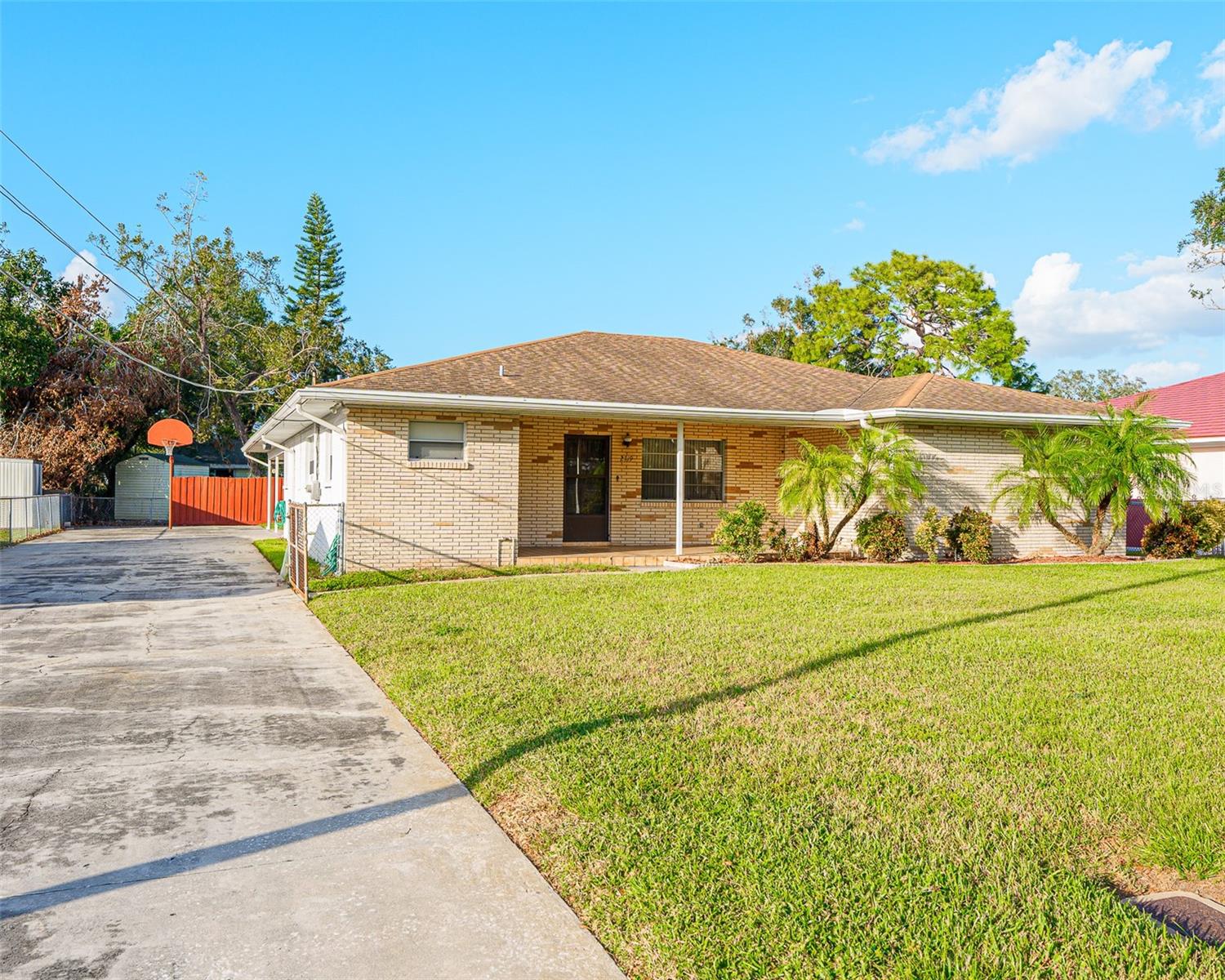 West side of house with long driveway