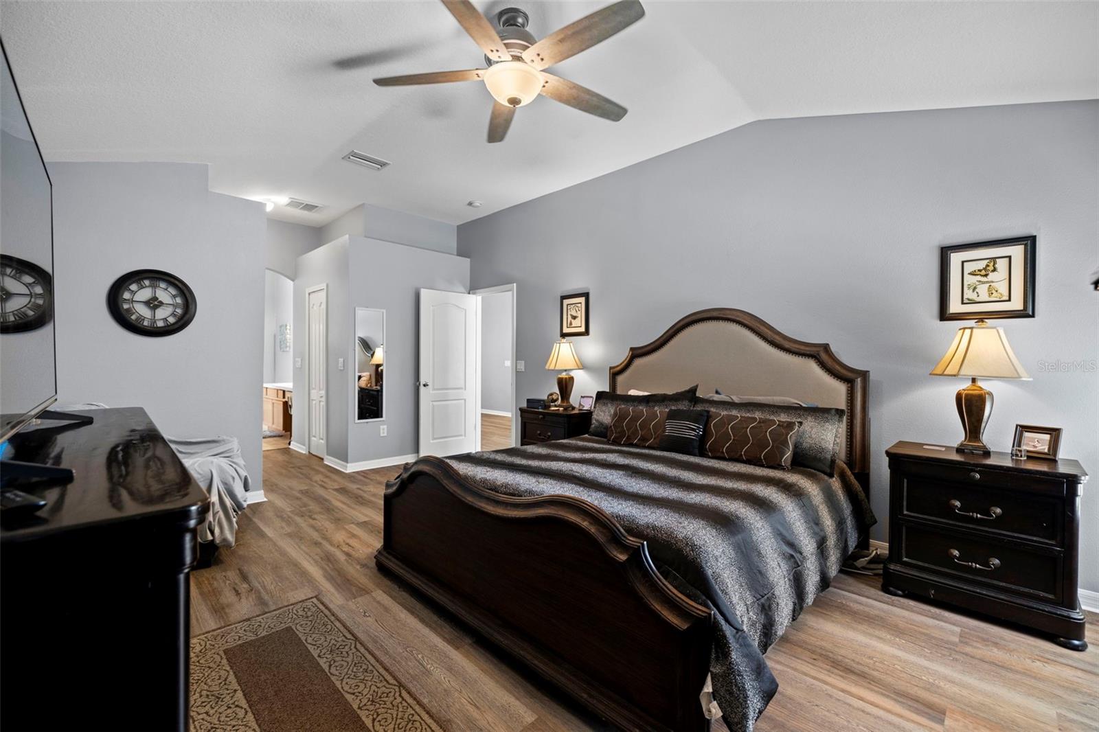 Your primary bedroom has two walk-in closets and the ensuite is down the center hallway.