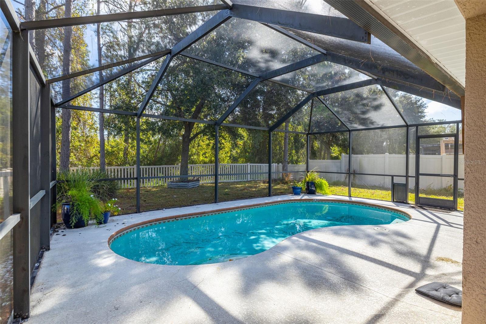 The screen in lanai and pool are inviting and provide a lot of privacy as well.