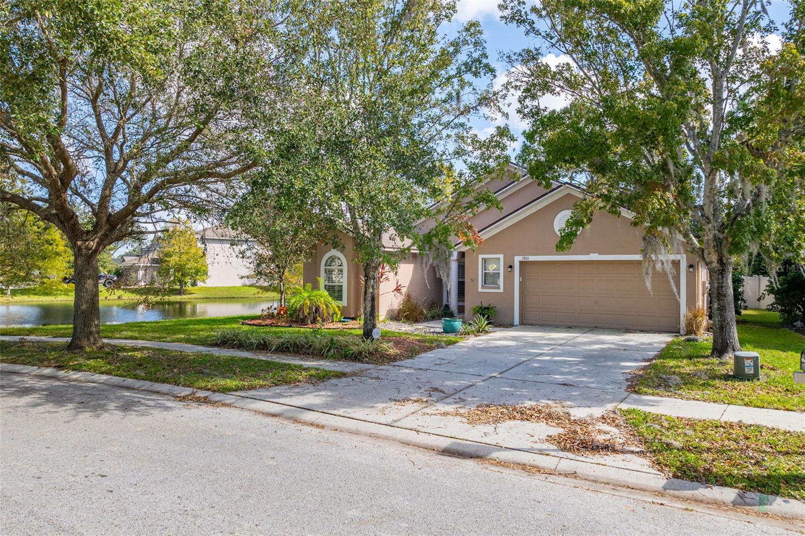 This lovely house next to the pond is one of the most desirable locations in the neighborhood.