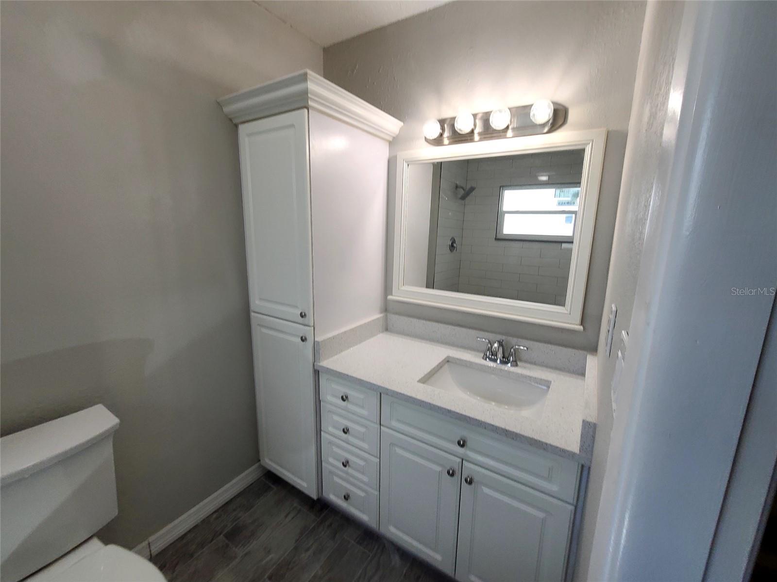 PRIMARY VANITY, QUARTZ COUNTERS, PULL OUT CABINETS