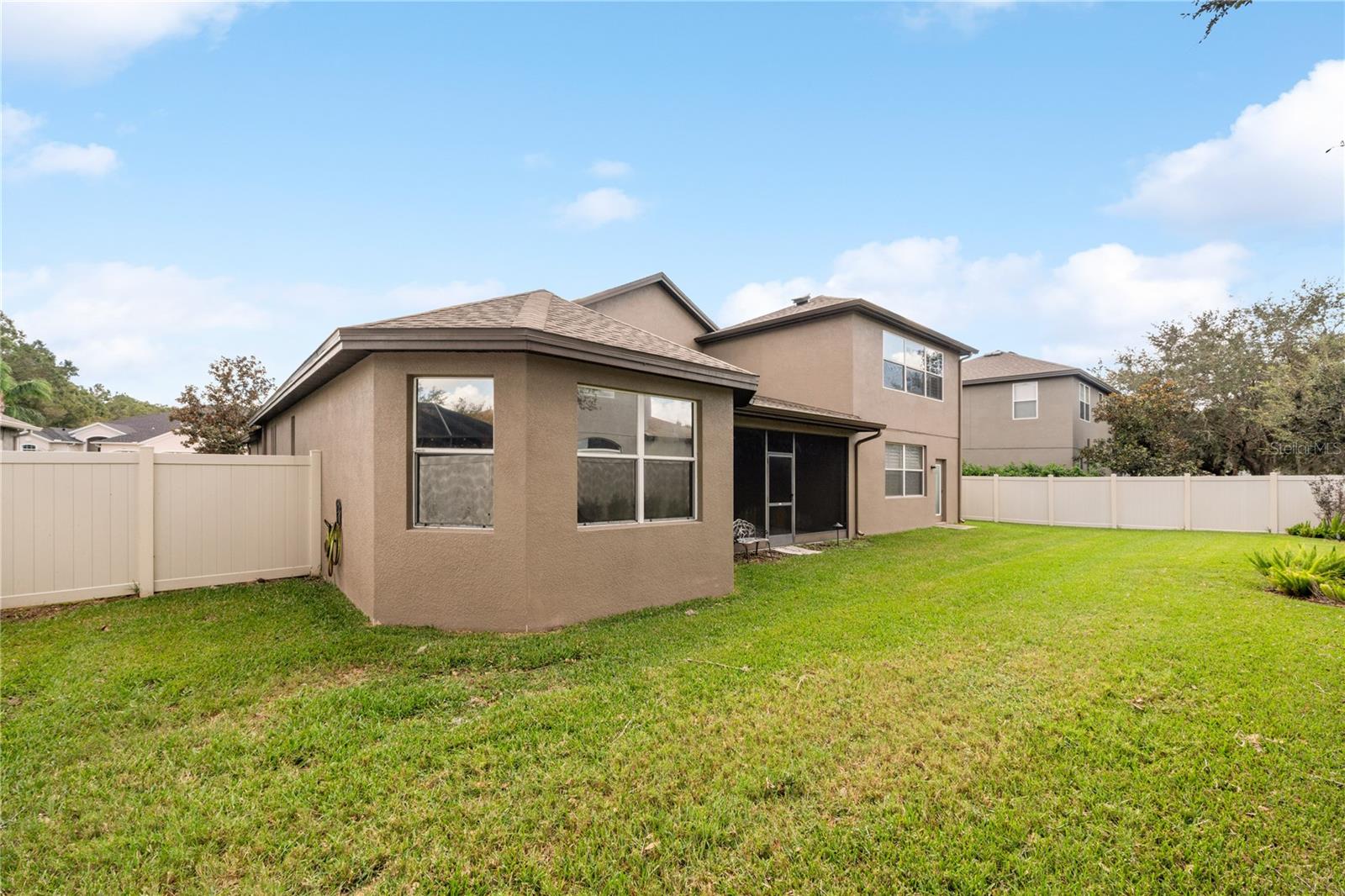 Expansive fully fenced yard