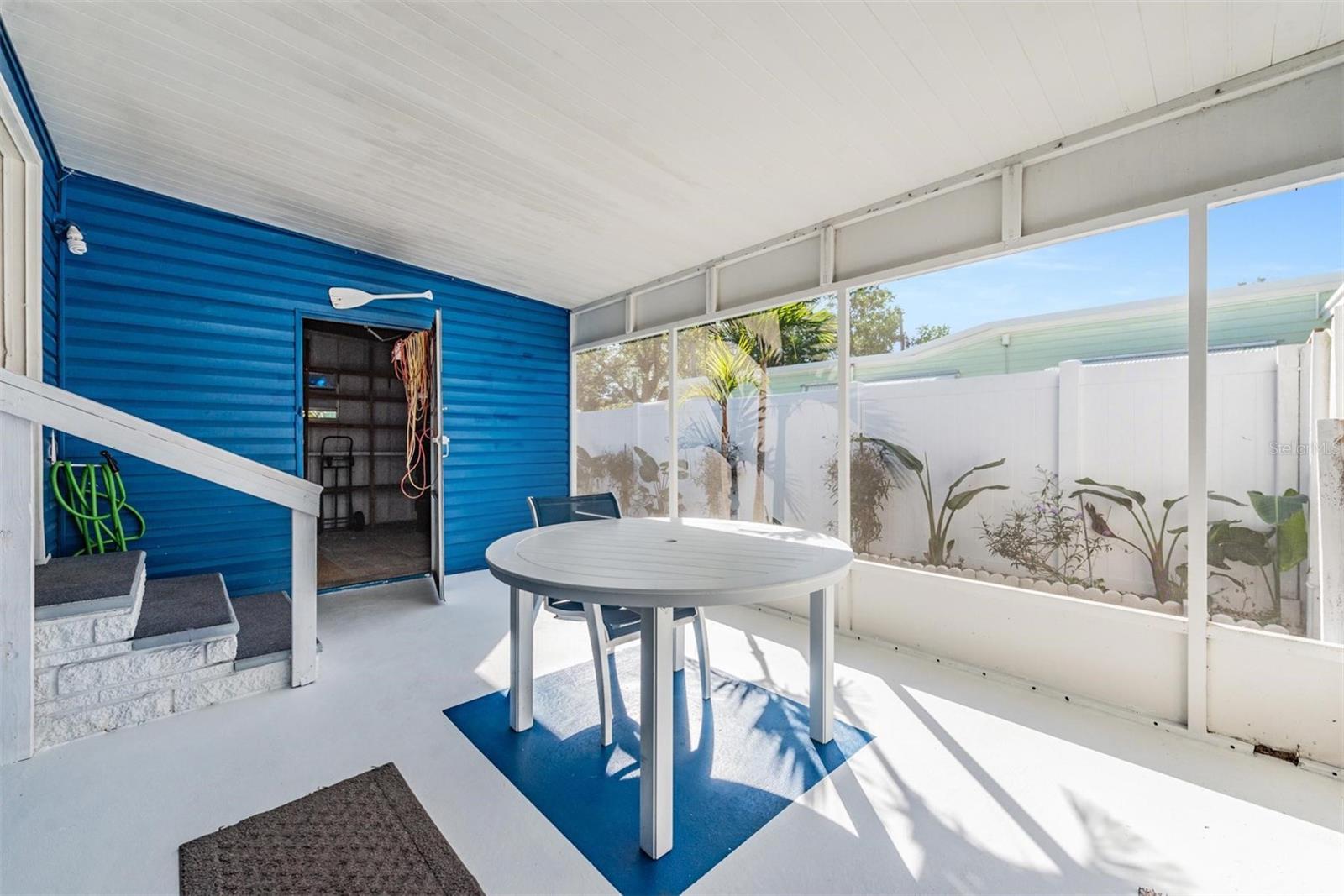 storage area entrance from enclosed patio