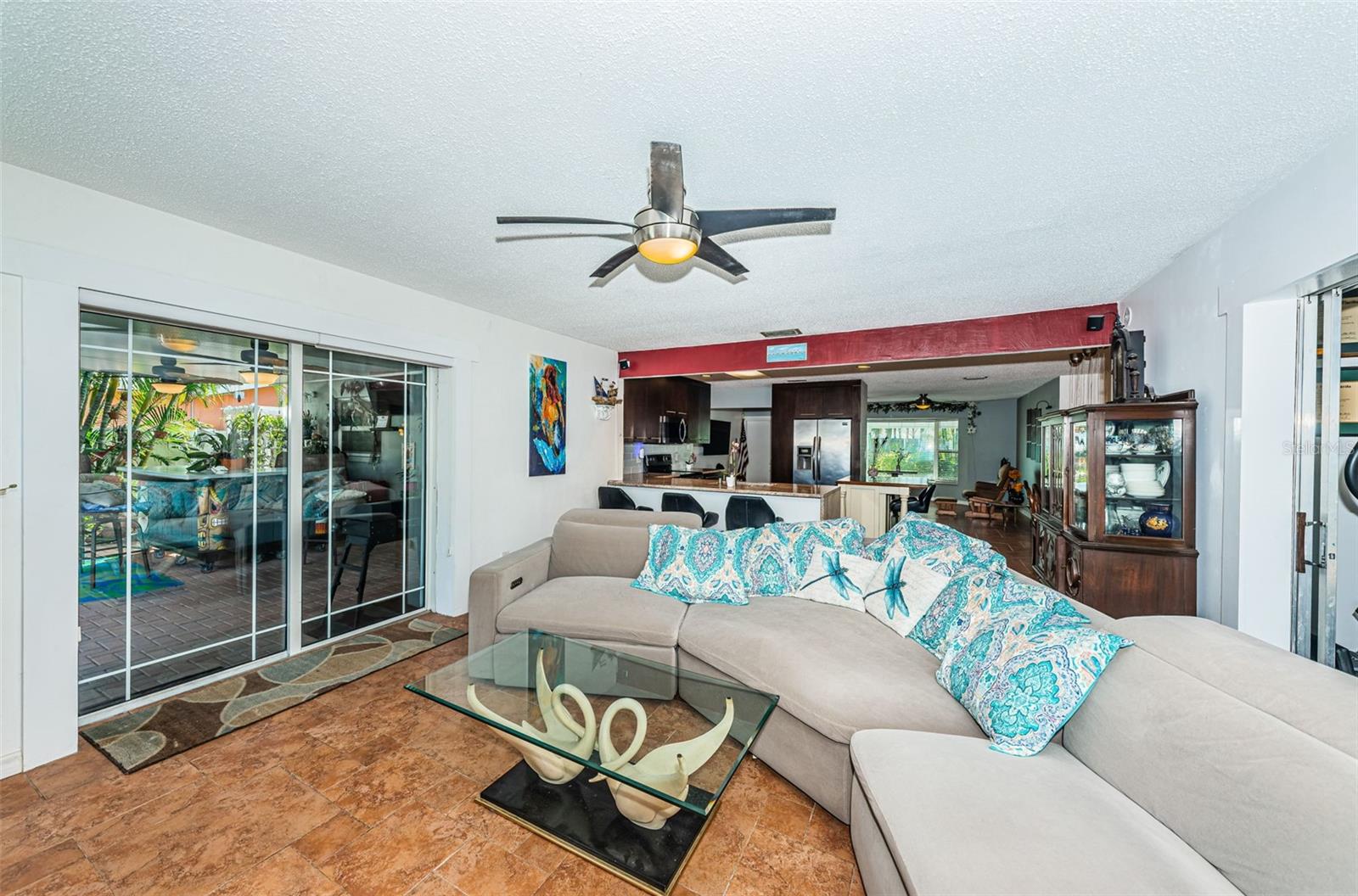 Family Room w/Fireplace open to Kitchen