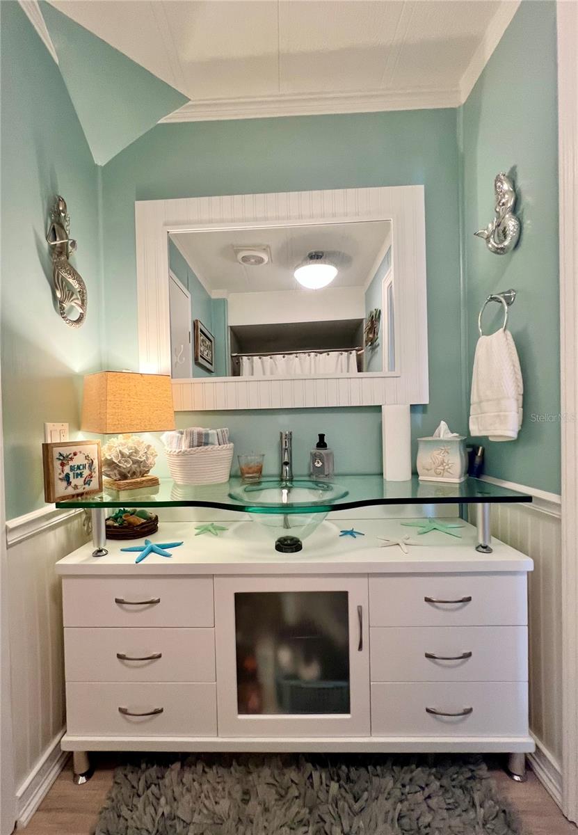 Bathroom from 2nd bedroom to laundry room.