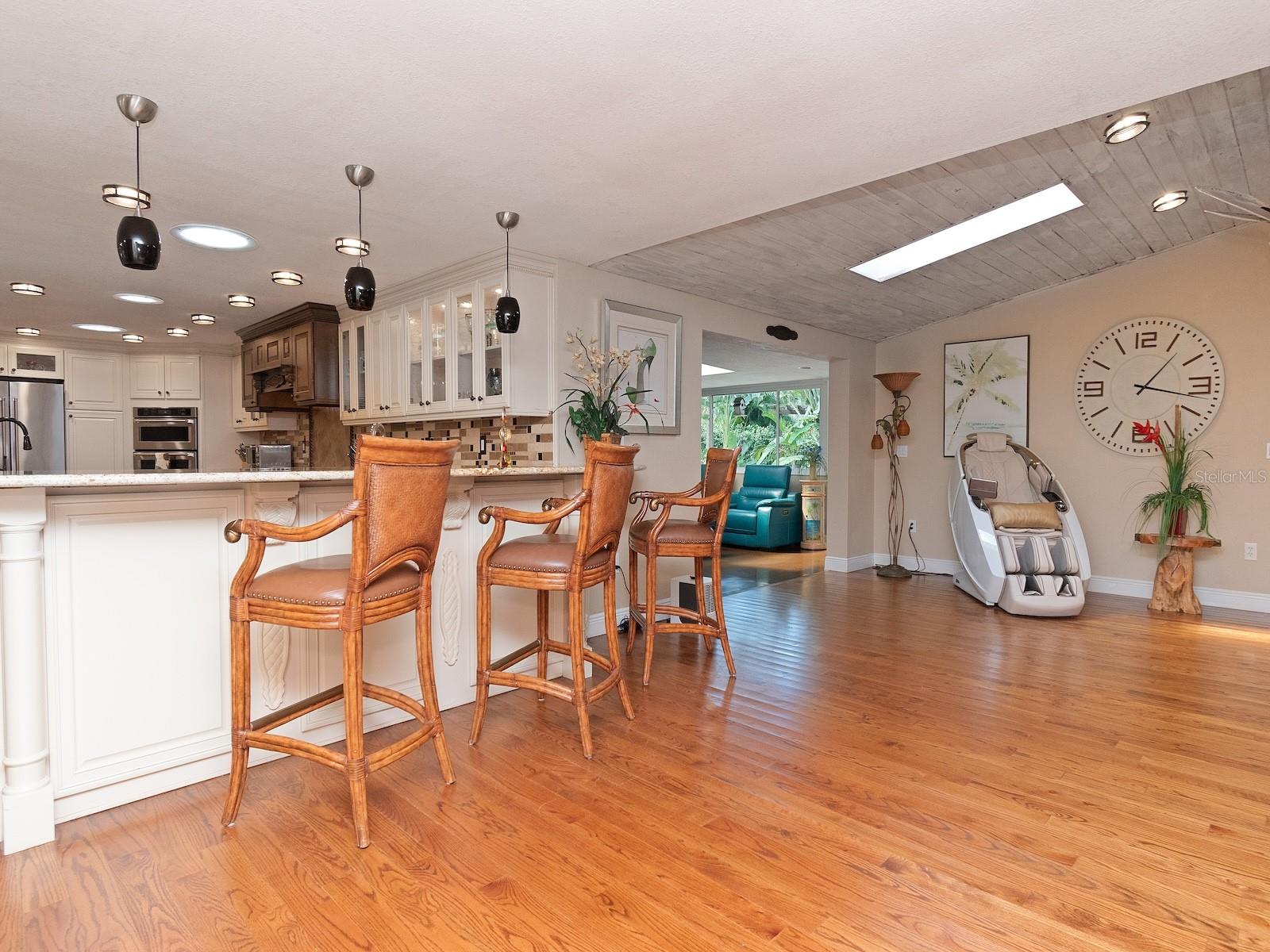 Kitchen opens to Dining room and great room