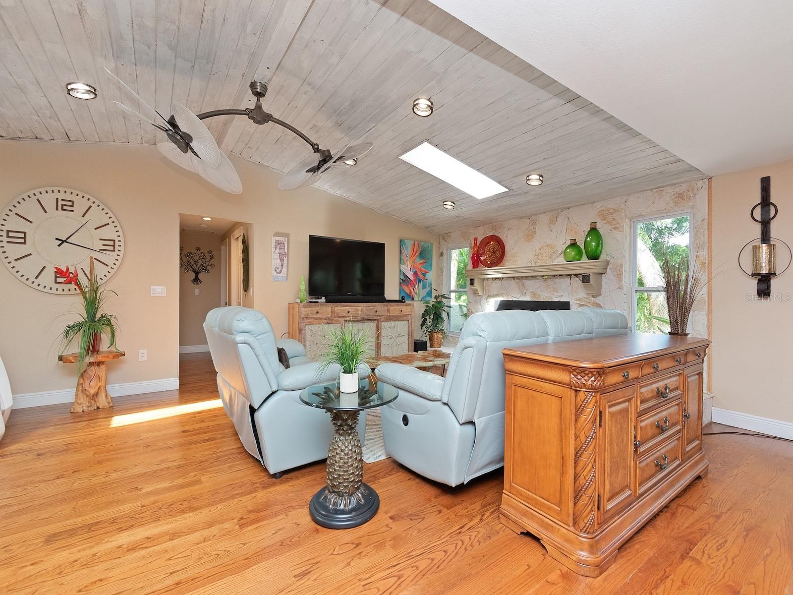 Wonderful wood plank ceiling to emphasis the cathedral ceilings