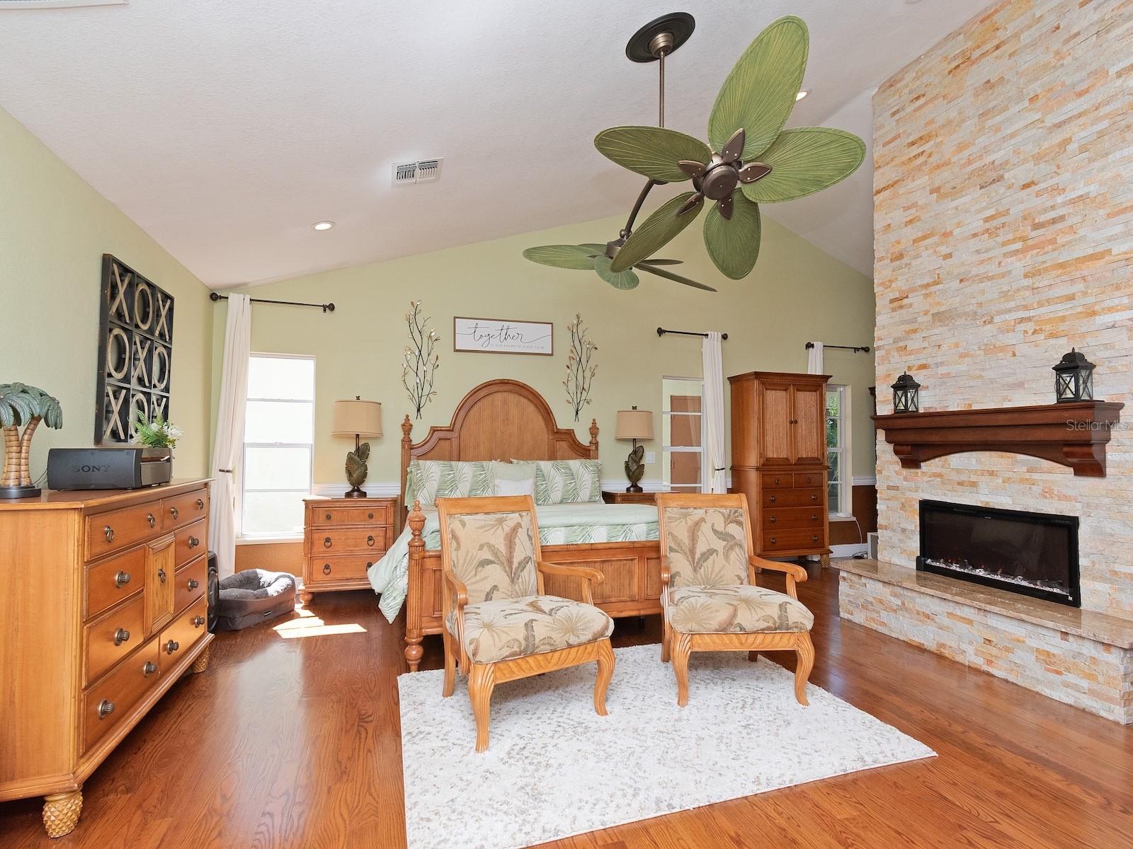 Large Master bedroom with double sided beautiful fireplace