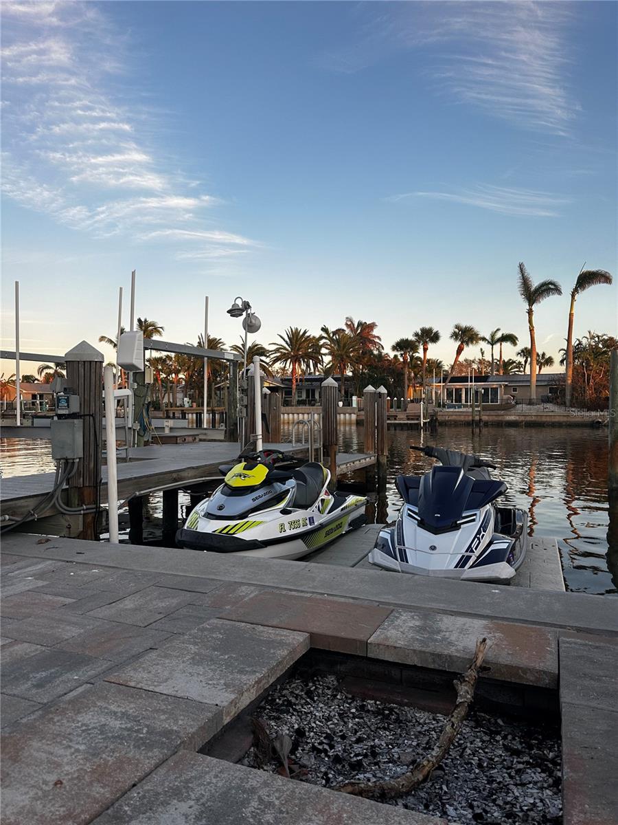 Floating jet ski dock and firepit